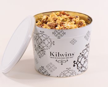 Kilwins popcorn tin filled with caramel popcorn