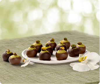 a plate of dark and milk chocolate dubai buckeyes